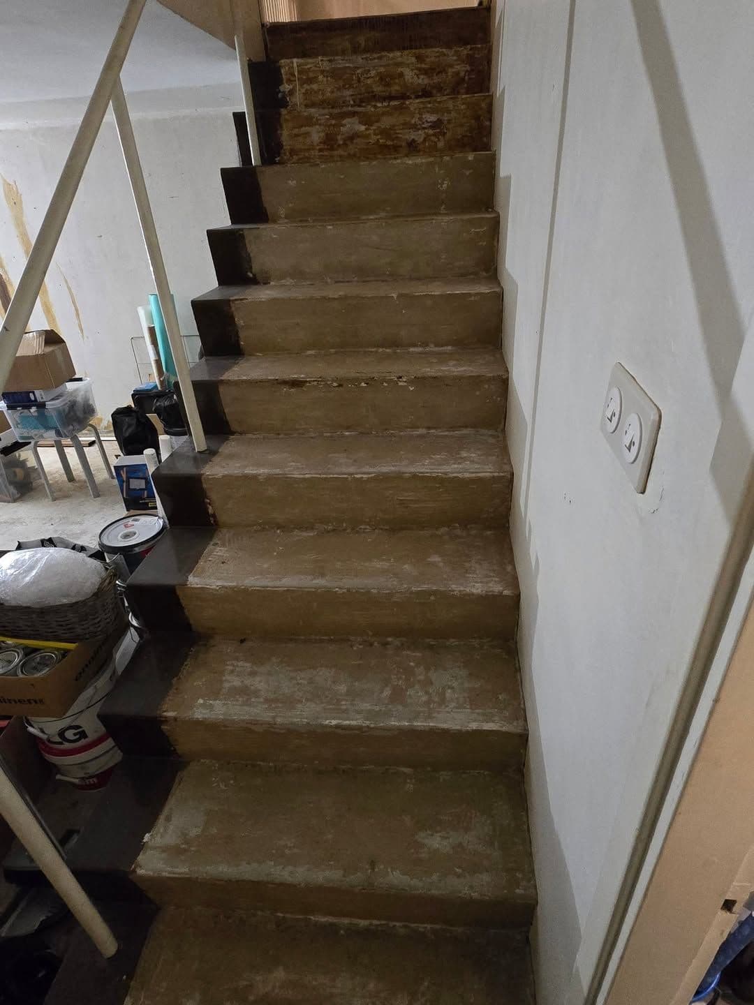 Before and after image of a staircase renewal in Maunula